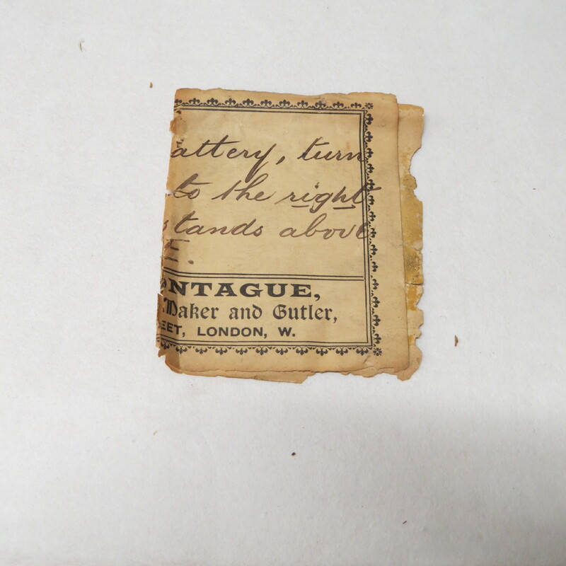 one side of a card from J.H. Montague, Surgical Instrument Maker and Cutler (101 New Bond Street, London) with a handwritten instruction "To start Battery, turn the handle to the right so that it stands above the letter  E."