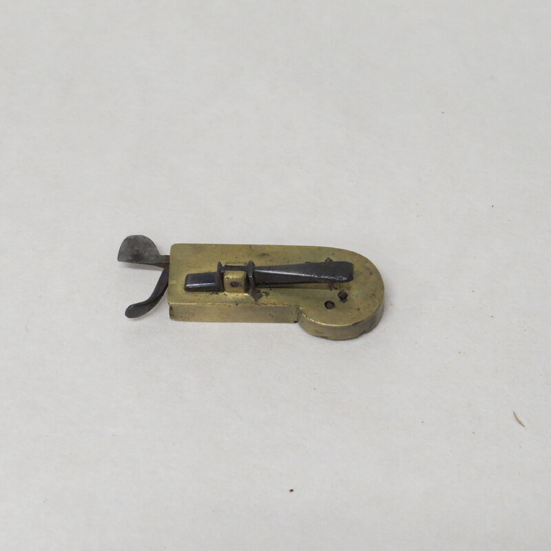 Brass spring lancet with steel lever release.