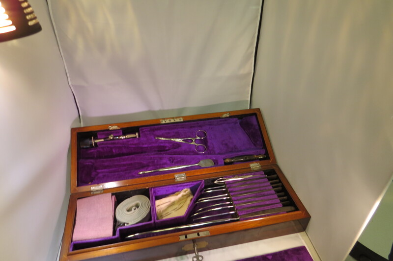 Surgical set. Set includes: 8 surgical knives, 1 artery forceps, 5 surgical needles, 1 elastic bandage, 1 tourniquet with an iron chain, 1 Galt's trephine,  1 trephine handle, 1 trepanning elevator and rasps, 1 lithotomy forceps