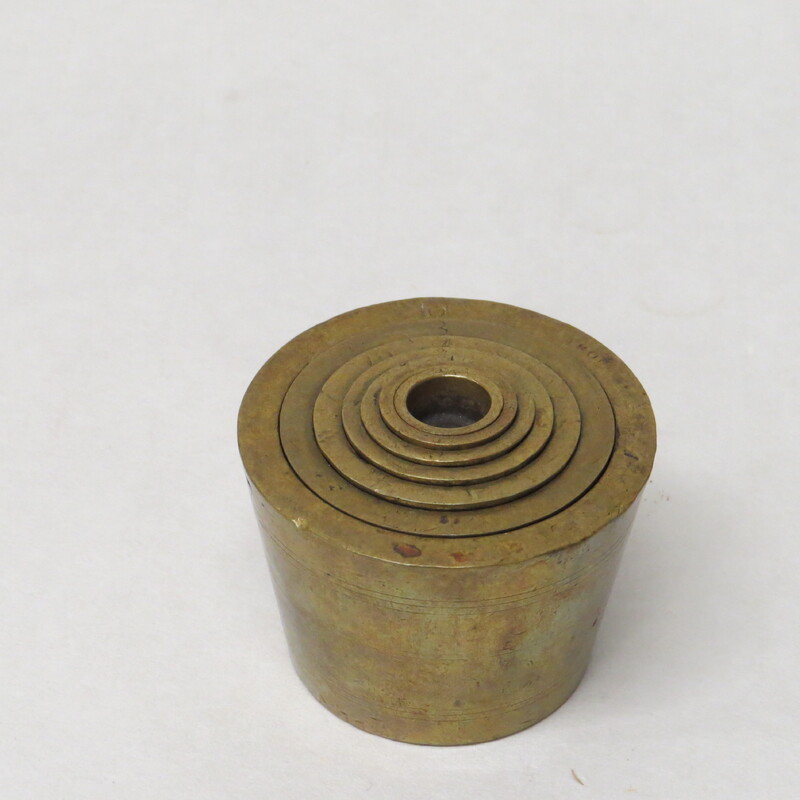 Brass nested weight set for assaying. 5 weights from 1.0 to 16.0. Stamped I T in center of 1.0 weight. Copper plated copper decorative mining pan, 9" diameter.