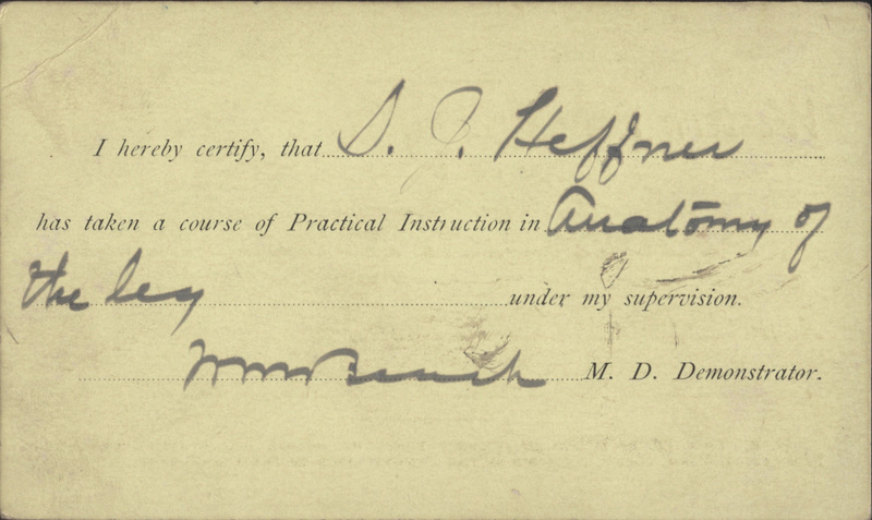 Yellow index card with typewritten and handwritten text. Reads: "I hereby certify, that "S.J. Heffner has taken a course of Practical Instruction in Anatomy of the Leg under my supervision. [Unknown Signature], M.D. Demonstrator." 