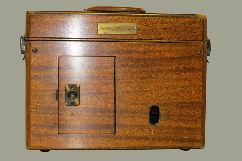 A wooden case with a handle and a brass plaque inscribed: "Dr. W.J.Armstrong." Case contains portable electrocardiograph (model 51, serial 9758).