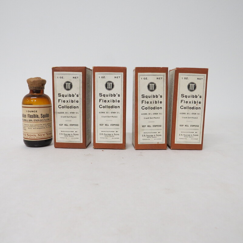 4 cardboard boxes with 1 glass sample bottle; Label reads: Liquid Court Plaster to be used on cuts, wounds, abrasions etc.