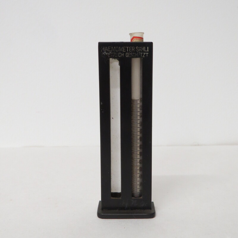 partially completed Haemometer as some black rubber tubes are damaged, black plastic round case with glass pipette inside