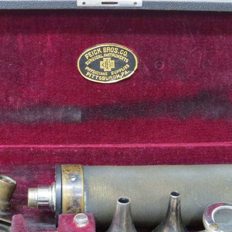 Otoscope with its parts inside of a case