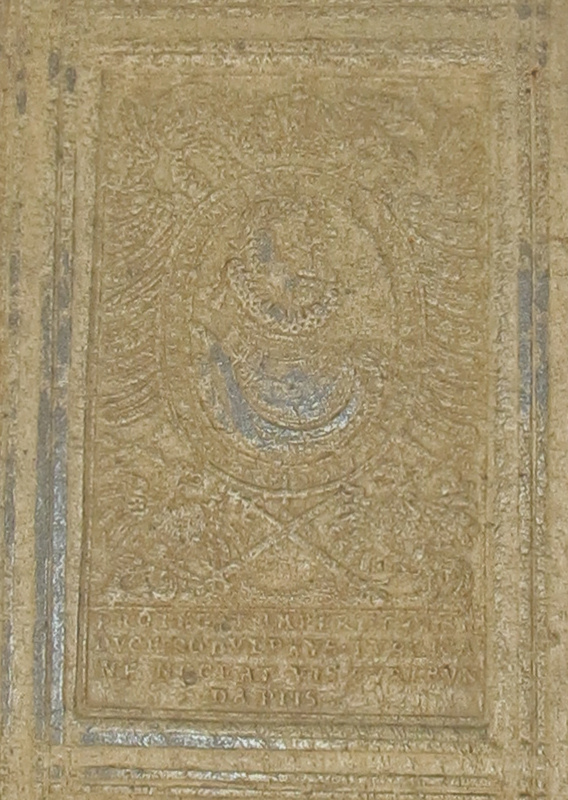 The front cover of Galen's Works: all gold with a portrait of Rudolph II.