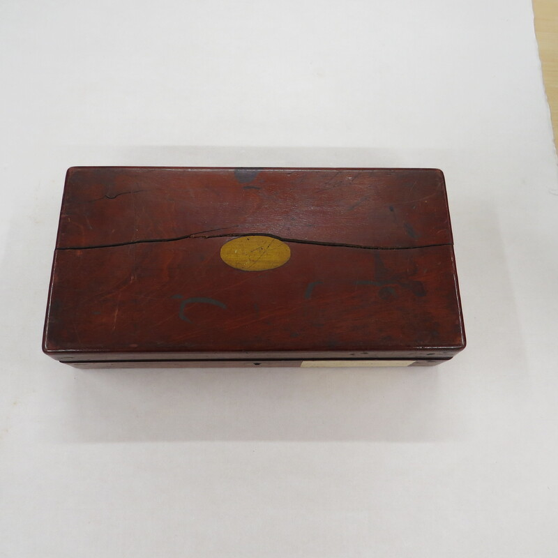 Wooden box containing lever stomach pump