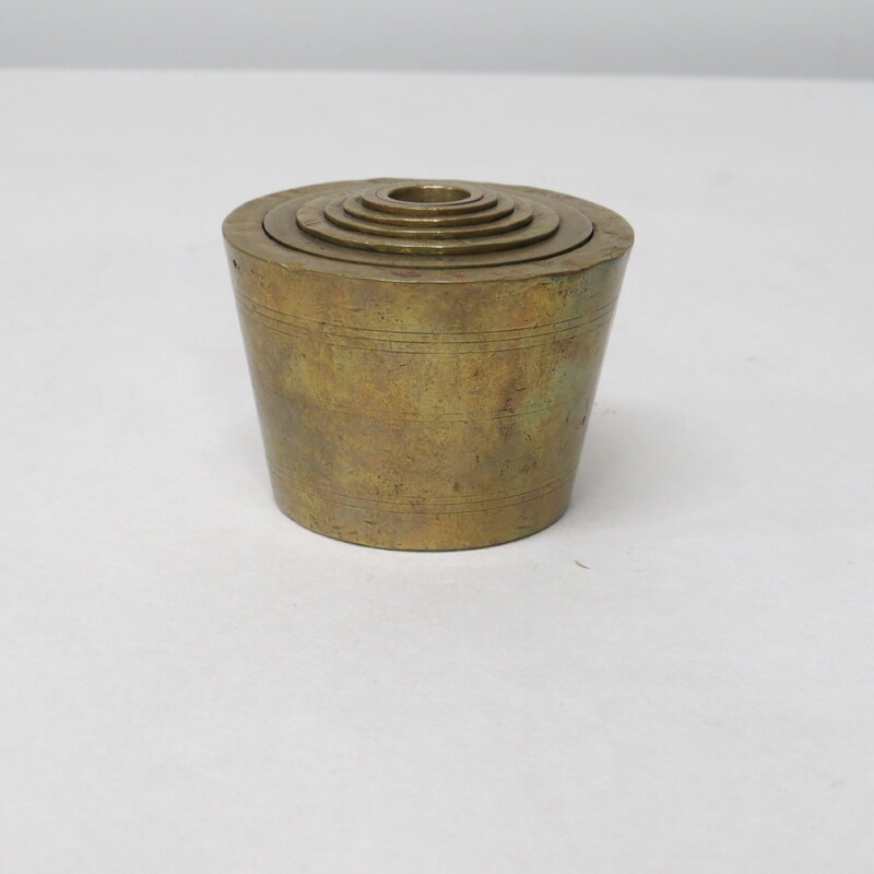 Brass nested weight set for assaying. 5 weights from 1.0 to 16.0. Stamped I T in center of 1.0 weight. Copper plated copper decorative mining pan, 9" diameter.