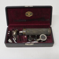 Opened otoscope container with  all  its parts inside