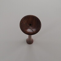 Typical unmarked, one piece wood Fergusson monaural stethoscope.