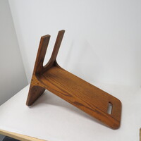 wooden stool used to raise feet