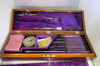 Surgical set. Set includes: 8 surgical knives, 1 artery forceps, 5 surgical needles, 1 elastic bandage, 1 tourniquet with an iron chain, 1 Galt's trephine,  1 trephine handle, 1 trepanning elevator and rasps, 1 lithotomy forceps