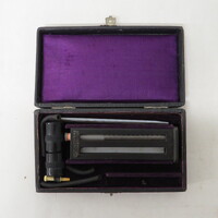partially completed Haemometer as some black rubber tubes are damaged, black plastic round case with glass pipette inside